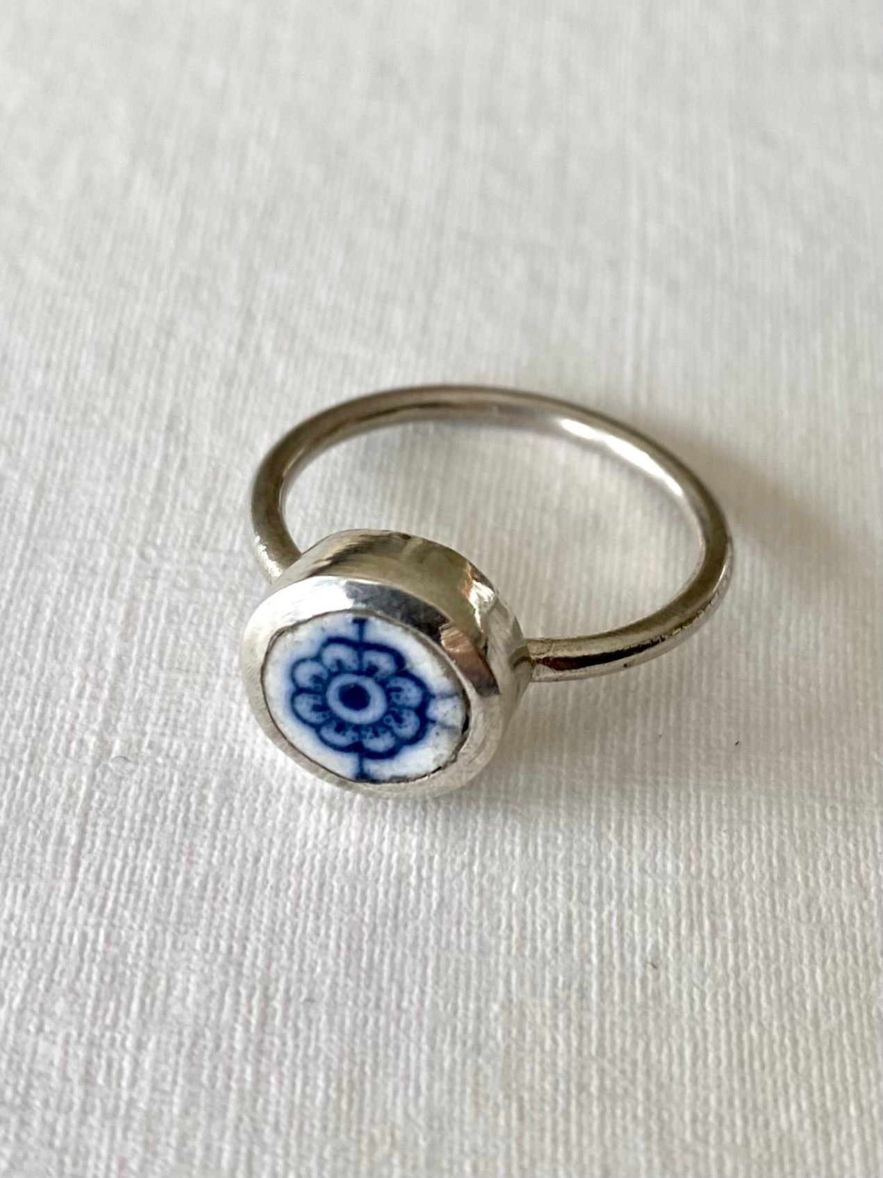Small ceramic blue and white flower ring