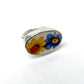Raised antique ceramic and sterling silver ring - front face view, blue and yellow daisy floral motif