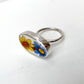 Raised antique ceramic and sterling silver ring - side profile showing elevated bezel and band detail